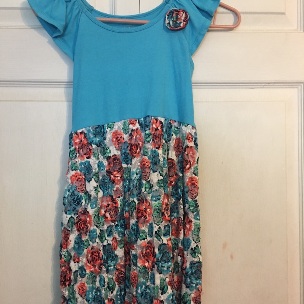 Blue dress with orange blue and green flowers